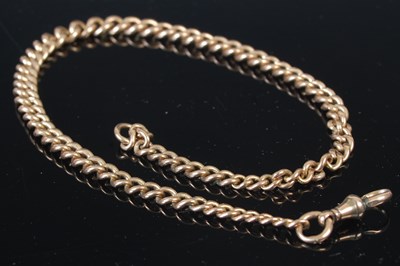Lot 299C - A 9ct gold graduated Albert chain, 42.3 grams.