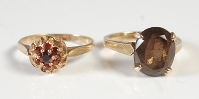 Lot 70 - Two rings to include a 9ct gold and garnet...