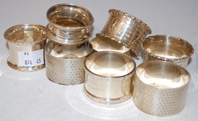 Lot 126 - Nine assorted vintage silver napkin rings,...