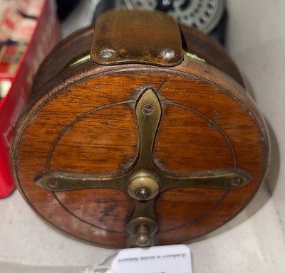 Lot 226 - An Antique wood and brass fishing reel, 11.5cm...