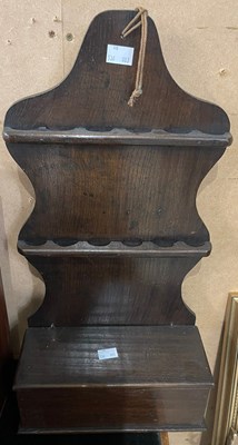 Lot 340 - An antique carved wooden pipe rack, 52cm high...