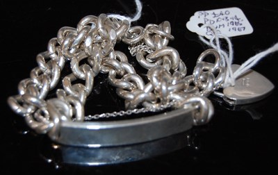 Lot 126C - A silver identity bracelet with vacant bar,...