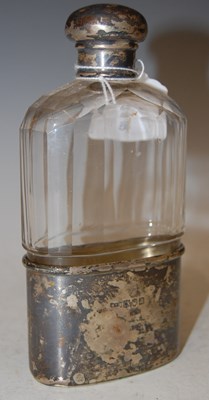 Lot 129 - A London silver mounted clear glass spirits...