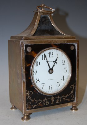 Lot 130 - A George V silver and tortoiseshell mantel...