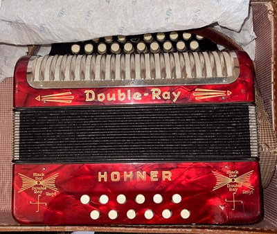 Lot 364 - A vintage Hohner Double Ray Accordion, in red...