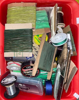 Lot 421 - A box of assorted fishing line; etc.