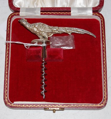 Lot 143 - A Birmingham silver corkscrew, the handle...
