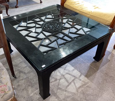 Lot 709 - A Chinese darkwood square shaped coffee table,...