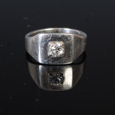 Lot 257S - A white metal dress ring, set with a single...