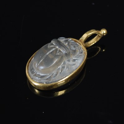 Lot 248J - A clear glass scarab beetle pendant decorated...