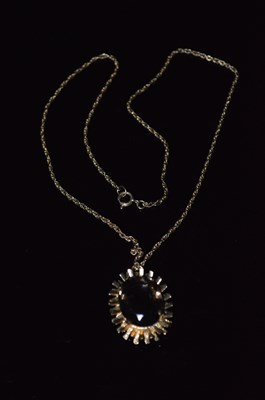 Lot 50J - A 9ct gold mounted Cairngorm pendant suspended...