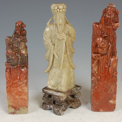 Lot 279 - A group of three Chinese soapstone carvings to...