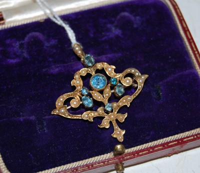 Lot 61B - A yellow metal split pearl and blue gem set...