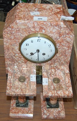 Lot 309 - A red and white marble mantel clock garniture,...