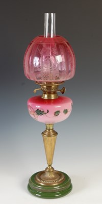 Lot 179 - A late 19th/ early 20th century brass oil lamp,...