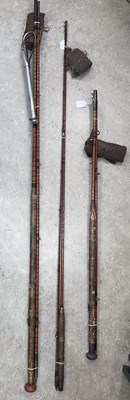 Lot 550 - Three assorted split cane fishing rods and a...