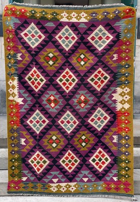 Lot 736 - A Maimana Kilim rug, the purple ground...