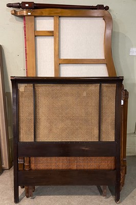 Lot 777 - Two Bergere style single beds, lacking rails;...