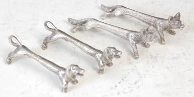 Lot 312 - Two silver dachshund knife rests, Sheffield,...