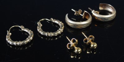 Lot 496 - A pair of 9ct gold half hoop earrings; a pair...