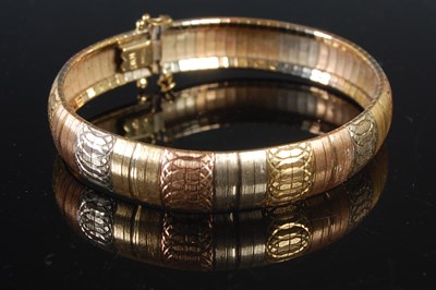 Lot 210 - An Italian tri-colour 18ct gold articulated...
