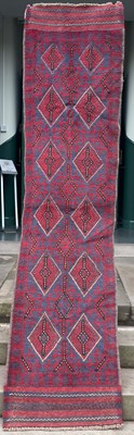 Lot 874 - A Meshwani runner with a blue ground decorated...