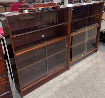 Lot 832 - A pair of mid-century glass fronted bookcases,...