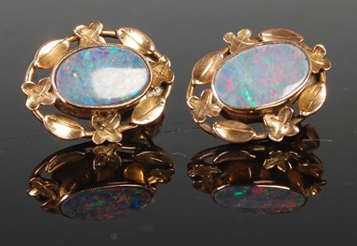 Lot 357 - A pair of gold and opal earrings, with...