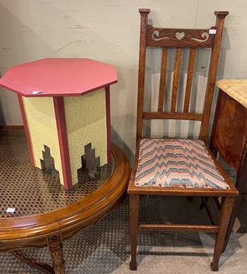 Lot 820 - An early 20th century Arts & Crafts style oak...