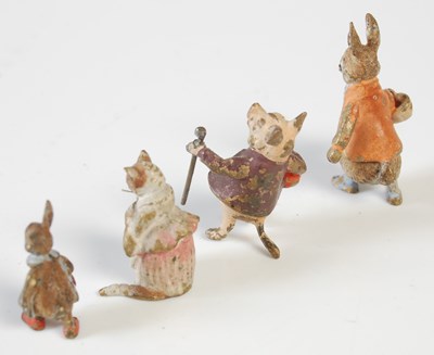Lot 380 - Four various cold painted bronzed Beatrix...