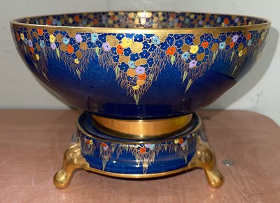 Lot 701A - A Carltonware blue ground pottery bowl on...