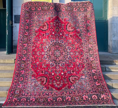 Lot 908 - A 20th century Persian carpet, the rectangular...