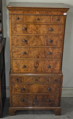 Lot 722 - An early 20th century burr walnut chest on...