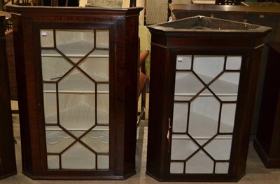 Lot 643 - A 19th century mahogany corner cabinet with...