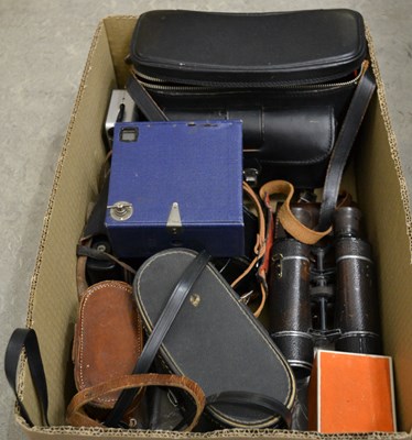 Lot 564 - A box of vintage cameras and binoculars, to...