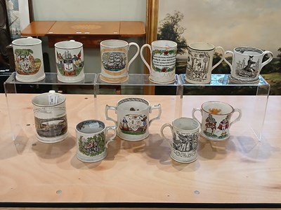 Lot 445 - A 19th century frog ceramic loving cup with...