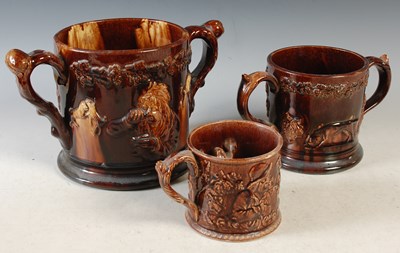 Lot 431 - A 19th century two-handled frog mug, the...