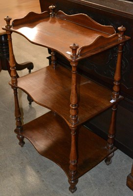 Lot 834 - A 19th century mahogany three tier whatnot...