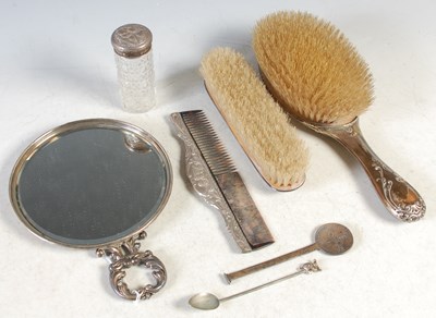 Lot 105 - A four piece Chester silver dressing table set...