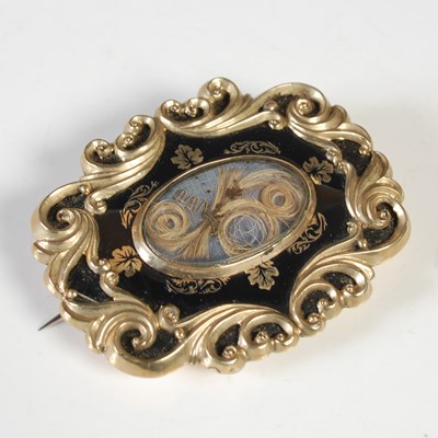 Lot 60 - A Victorian gold plated and black enamel...