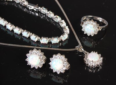 Lot 53 - A group of 14ct white gold and opal set...