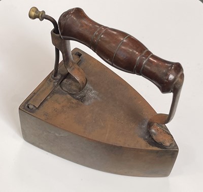 Lot 313 - A 19th century cast iron box iron with a...