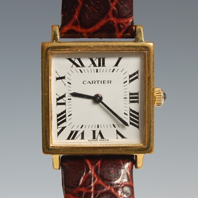 Lot 8 - A ladies Cartier gold plated wristwatch, the...