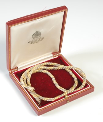 Lot 40 - An 18ct gold two colour rope twist necklace,...