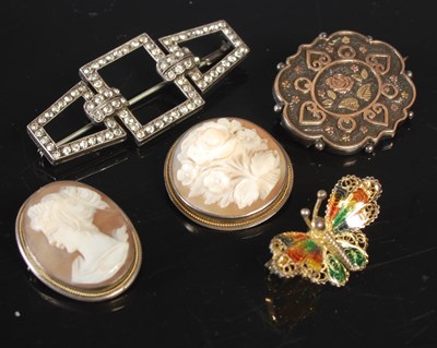 Lot 64 - A group of five assorted brooches, to include...