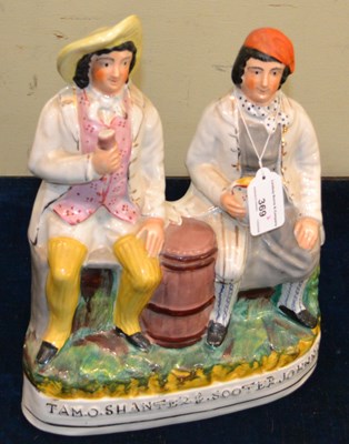 Lot 369 - A Staffordshire flat back ceramic figurine of...