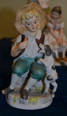 Lot 380 - An assortment of figurines to include a...