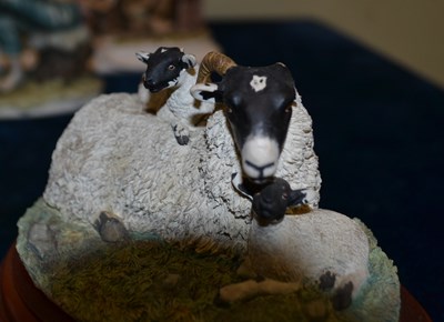 Lot 380 - An assortment of figurines to include a...