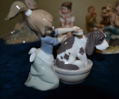 Lot 380 - An assortment of figurines to include a...