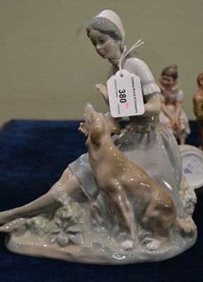 Lot 380 - An assortment of figurines to include a...